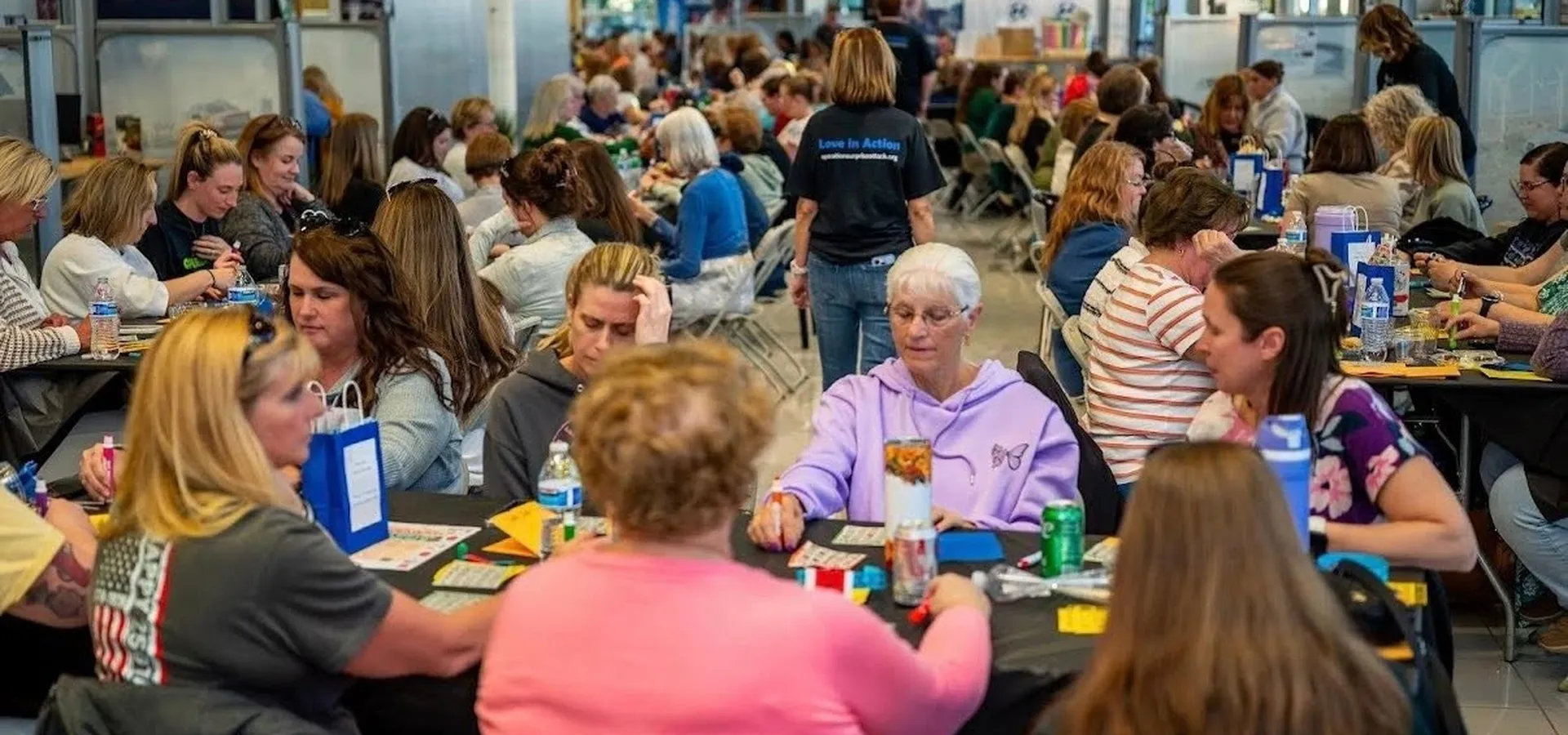 A packed bingo fundraiser hall
